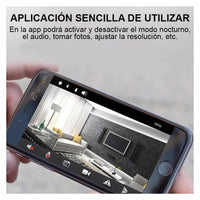 Mini Camara WiFi A9 - Vista frontal en soporte